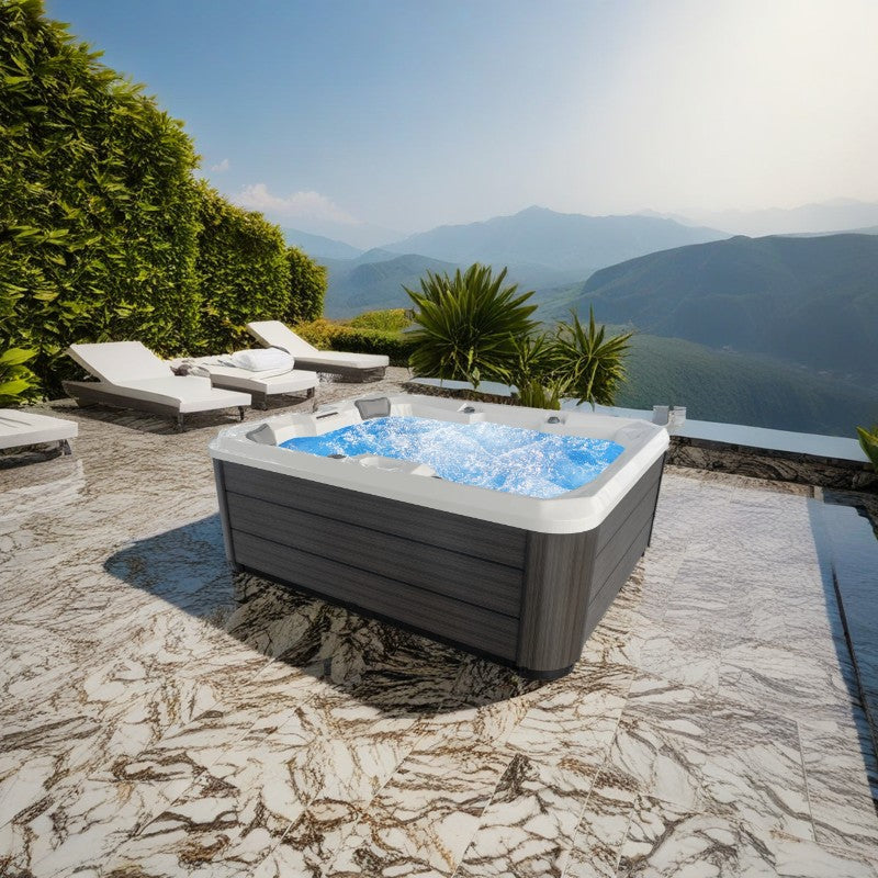 Jacuzzi Hydra 170 en patio con vistas a la montaña.