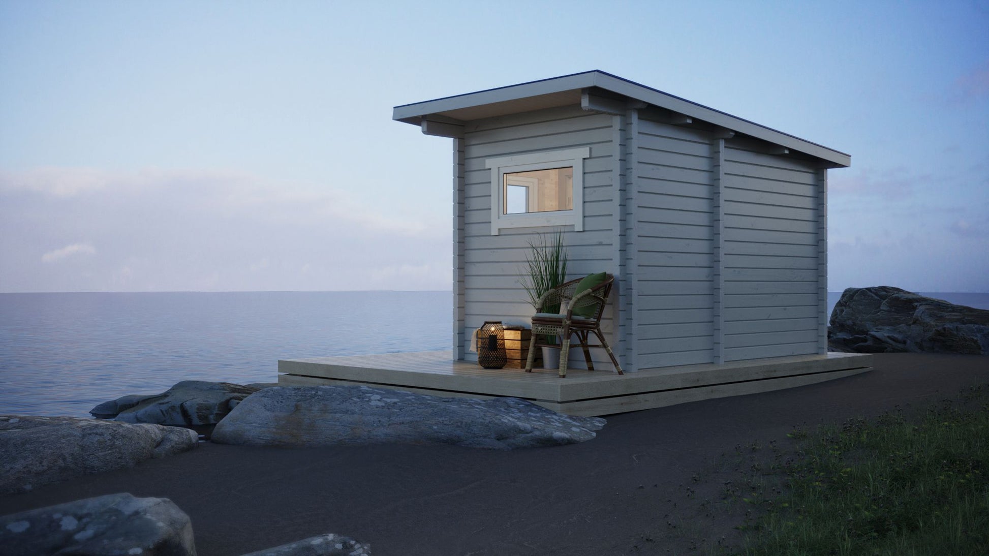 Saunamo Sauna al aire libre Nordica en la playa con silla y planta.