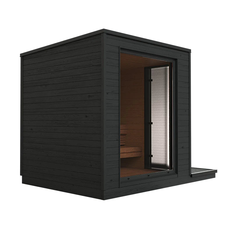 Sauna eléctrica exterior KUUT L con puerta y ventana visibles.